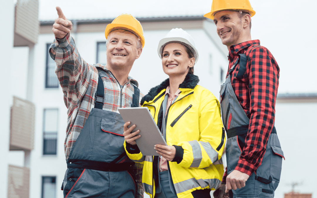 A clipboard with a safety checklist is being reviewed by two people.